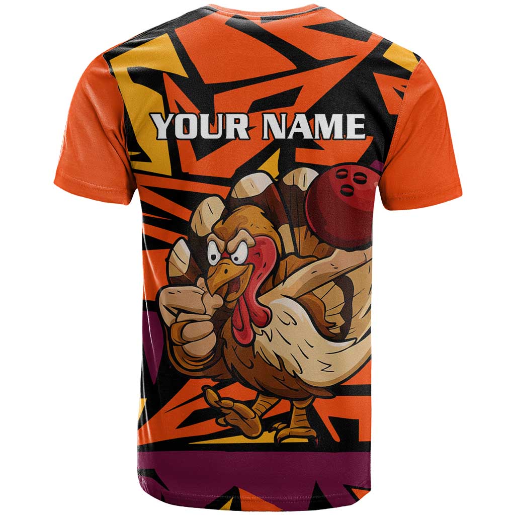 Custom Turkey Bowling T-Shirt with Cartoon Turkey Striker and Orange Geometric Pattern Graphic Tee