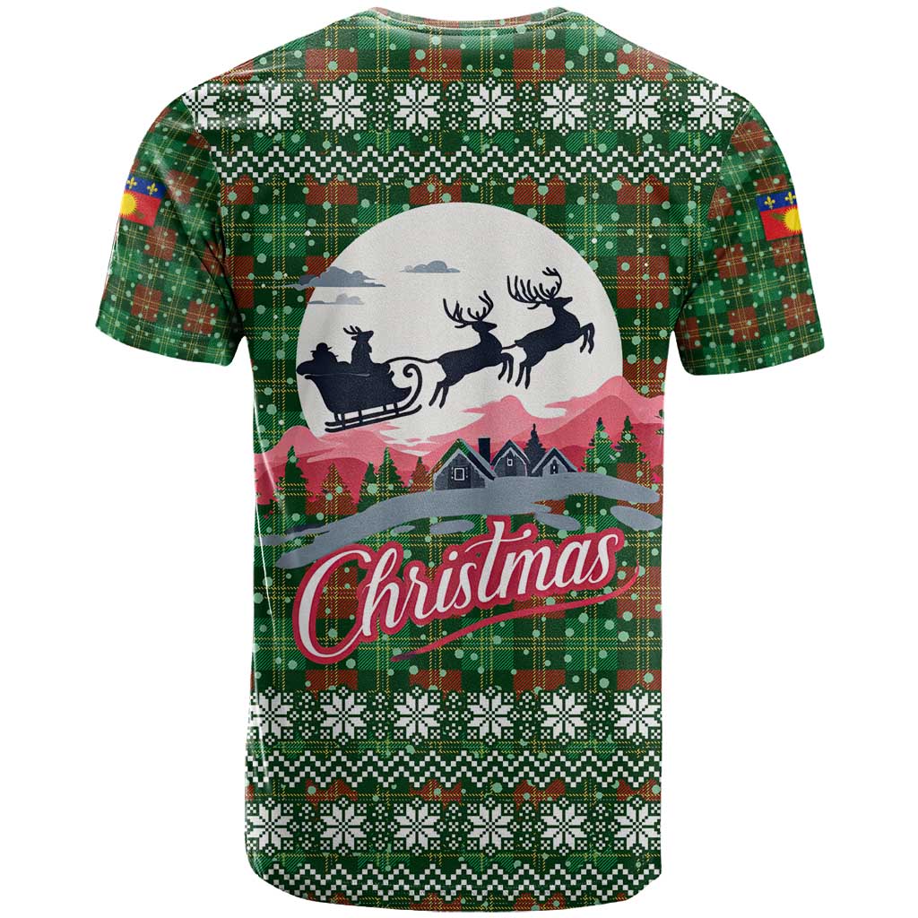 Guadeloupe Christmas T-Shirt with Green-Red Plaid Design, Sun and Sugarcane Emblem, and Santa Sleigh Motif Graphic Tee