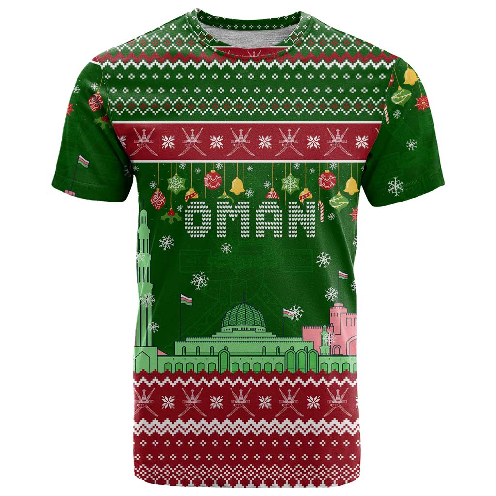 Oman Christmas T-Shirt with Green-Red Pattern, Mosque and Fort Landmarks, and Festive Ornament Motif Graphic Tee