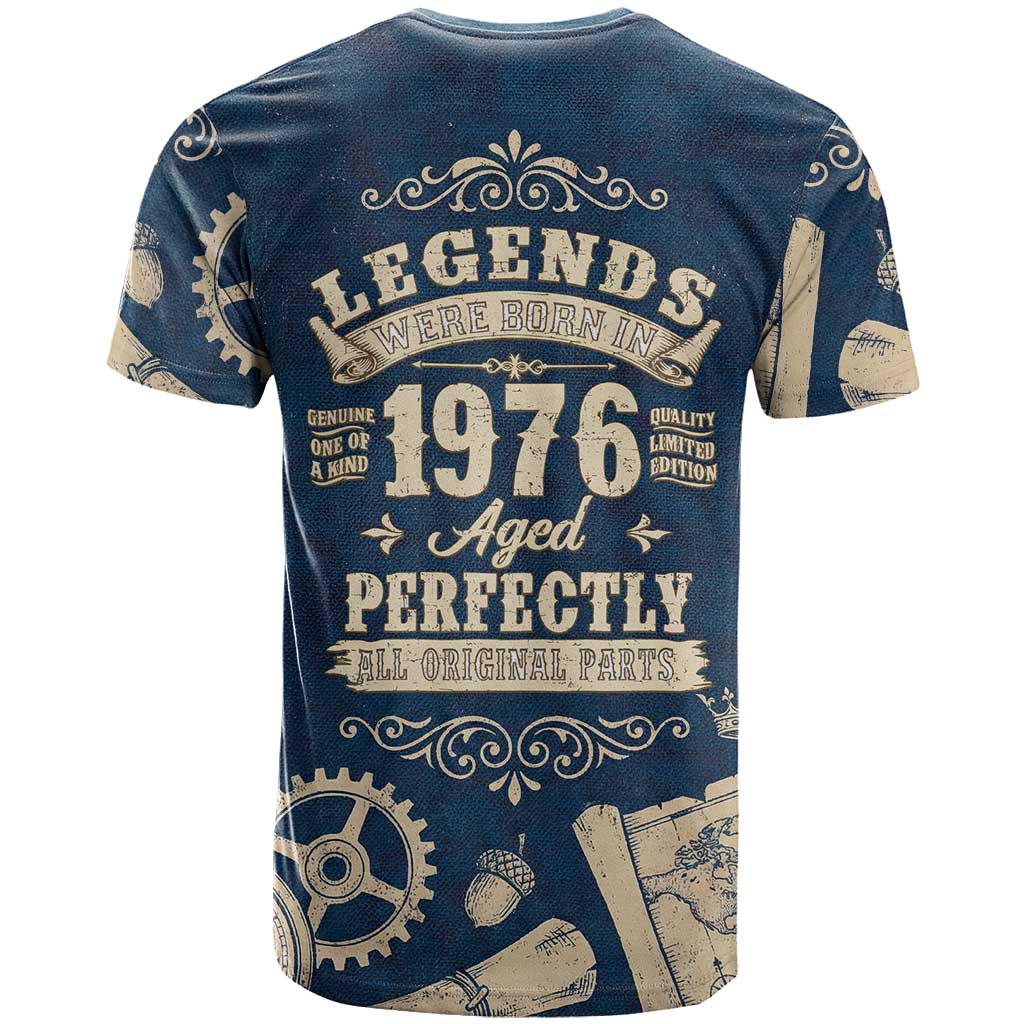 Legend 1976 Vintage Gears and Scrolls Design T-Shirt with Crown Motif in Classic Blue and Beige Retro Graphic Tee