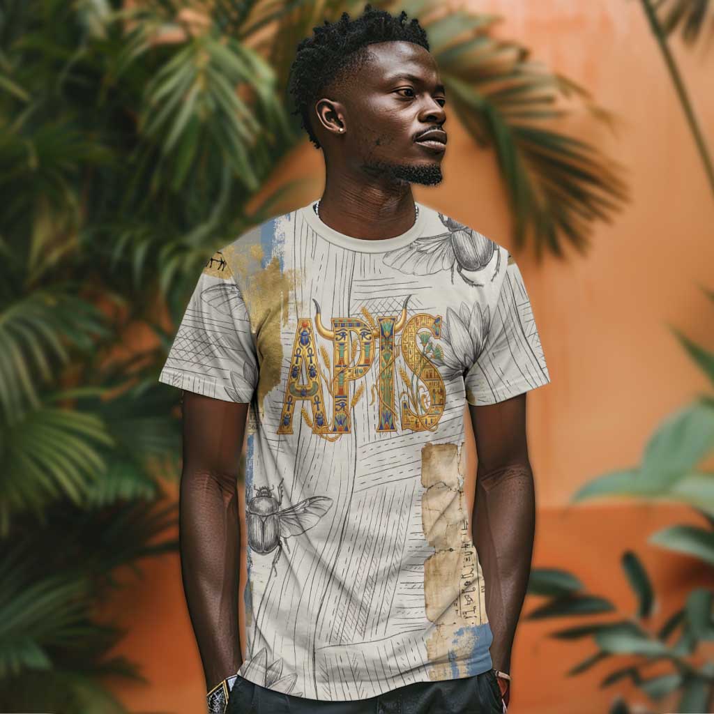 Apis Ancient Egyptian T-Shirt with Beige-Gray Hieroglyphic, Ornate Bull Head, and Gold-Blue Typography Graphic Tee